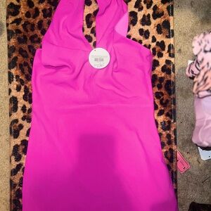 New with tags pink halter dress from boutique. Missing button. Size M